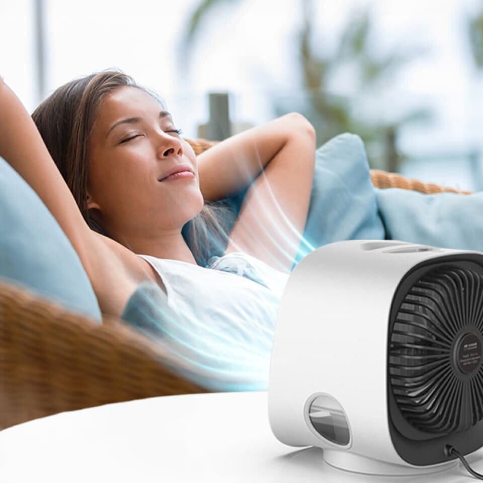 FrostyPure portable air cooler beside a bed